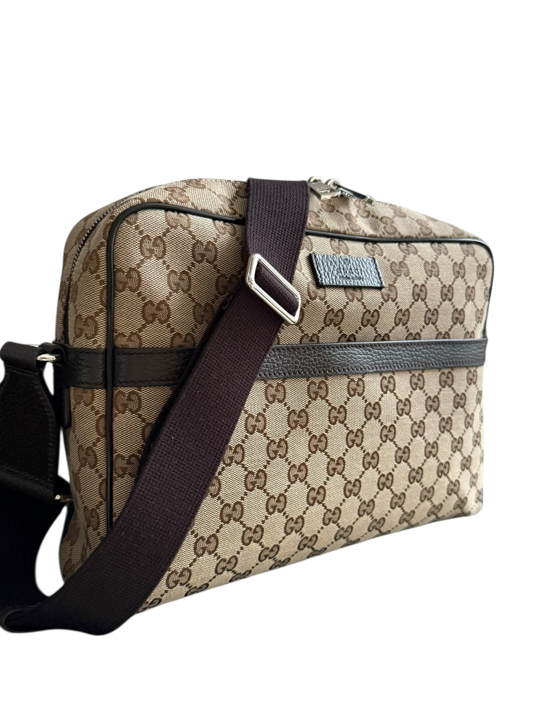 Gucci GG Canvas Messenger Bag.