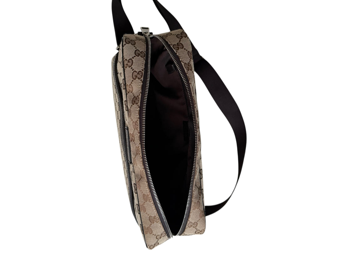 Gucci GG Canvas Messenger Bag.